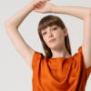SURKANA Blusa scollo a barchetta senza maniche